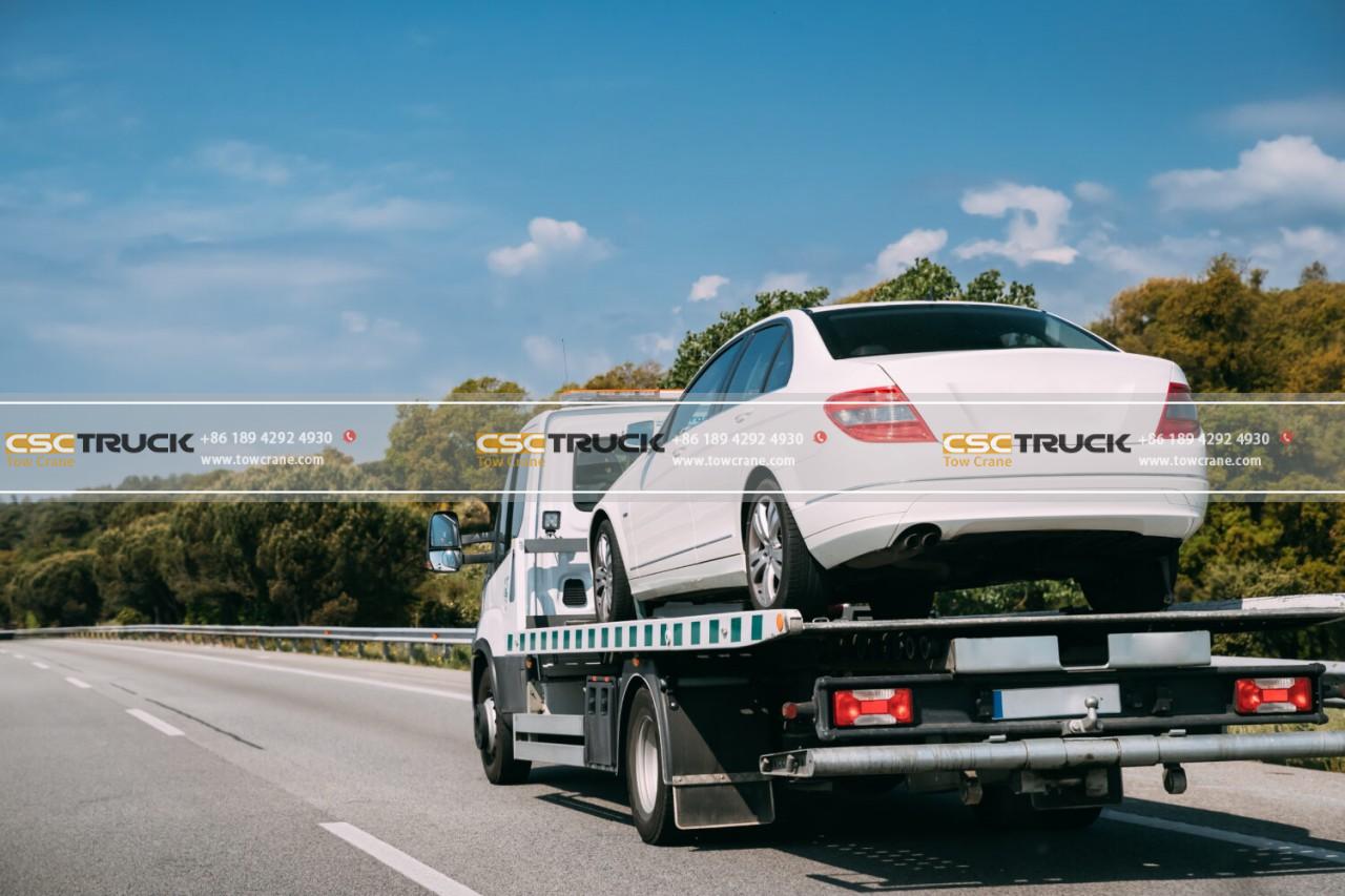 Car,Service,Transportation,Concept.,Tow,Truck,Transporting,Car,On,Motorway