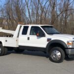 Wrecker Tow Trucks: Towing Heavy-Duty Challenges Wrecker Tow Truck