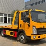 Kufananidza kweMatatu Matatu eMacranes muWind Farm Equipment Kuisa Howo 4.4Ton Rollback Carrier