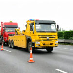 How Does a Wrecker Tow Truck Pull a Vehicle Out of a Ditch?